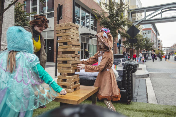 Kids in costume playing games at Boo and Brew at Bridge Park in Dublin.