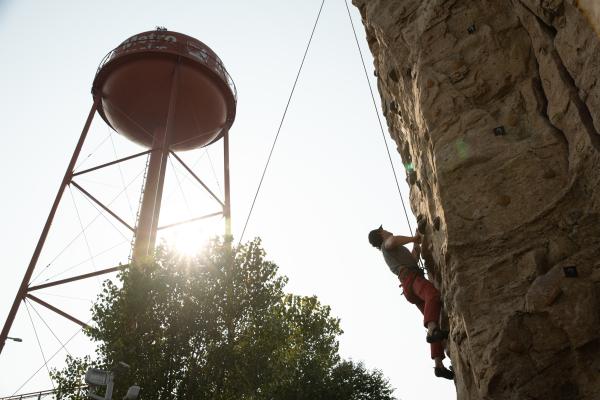 Man climbs rock wall at Scioto Audubon Metro Park