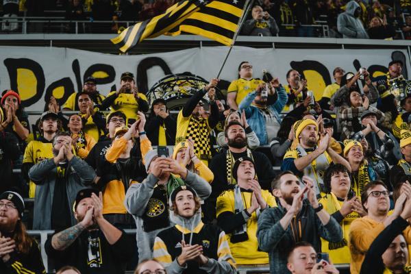 Fans cheering during Columbus Crew game at Lower.com field