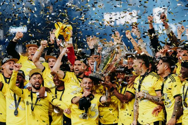 Columbus Crew holding MLS Cup 2023 trophy
