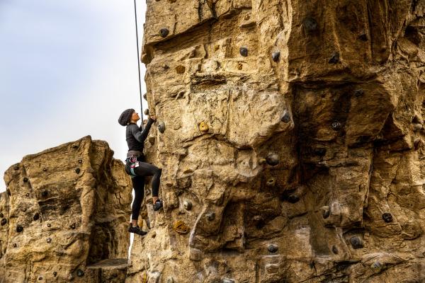 Woman rock climbing