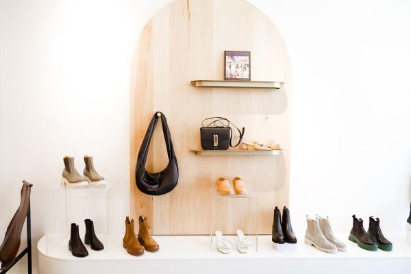 Shoes and handbags hanging in Pivot Columbus.