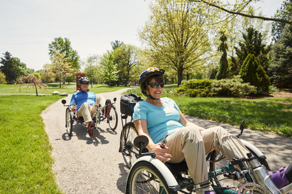 Rosemarie Rossetti and Mark Leder bike outdoors in Columbus