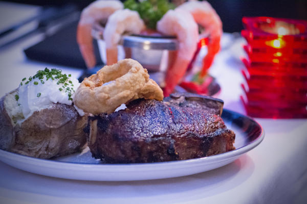 A shrimp cocktail and steak from The Top steakhouse in Bexley.