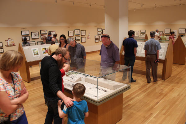 People at an exhibition at the Billy Ireland Cartoon Museum