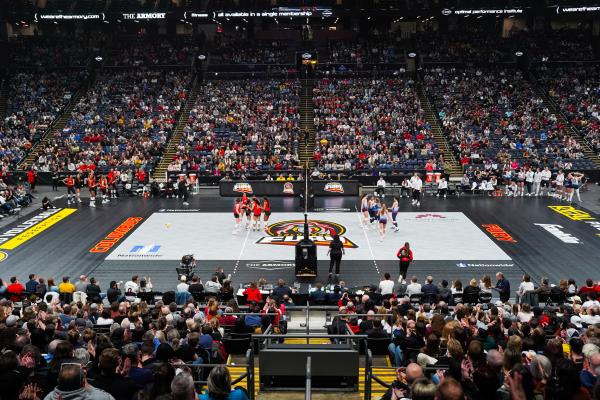 Columbus Fury volleyball court inside Nationwide Arena. Two teams prepare for the match