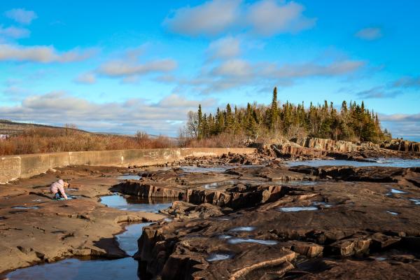A child playing near Artist's Point in Grand Marais.