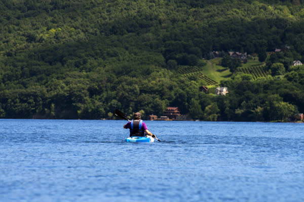 kayaking keuka lake with vineyard courtesy of corning and the southern finger lakes
