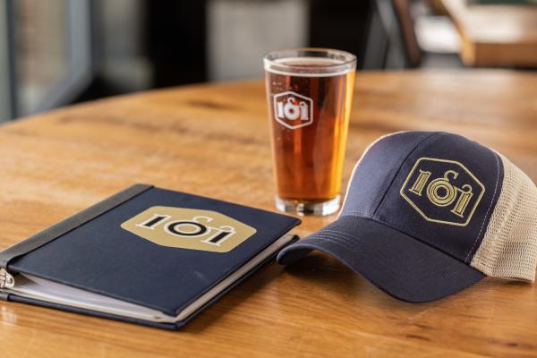 101 Beer Kitchen branded menu, beer and hat