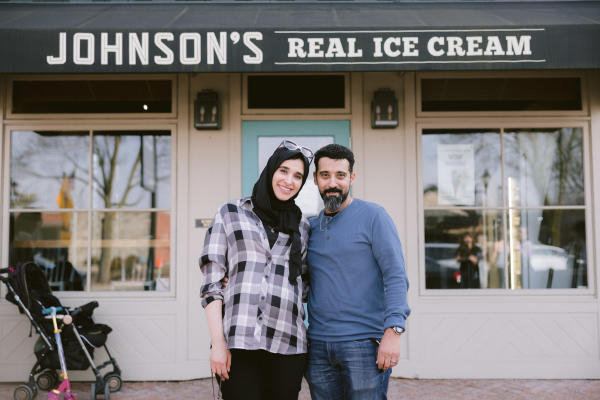 A couple posing in front of Johnson's Real Ice Cream in Historic Dublin.