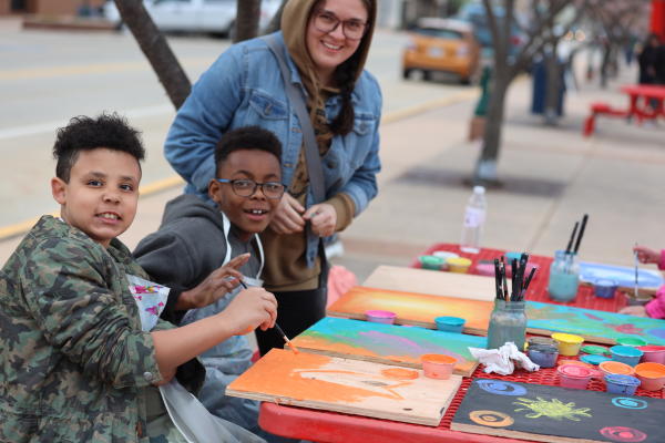 Elkhart ArtWalk kids painting at downtown Elkhart event