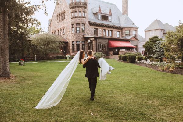 A couple walking to the resort after ceremony