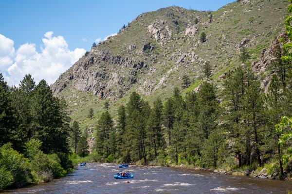 Rafting with Mountain Background
