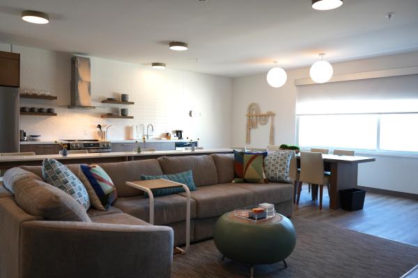 A photograph of a spacious living and kitchen area at the Element Hotel in Fort Smith, Arkansas.