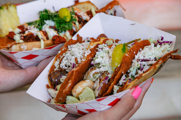 Plate of tacos with various toppings