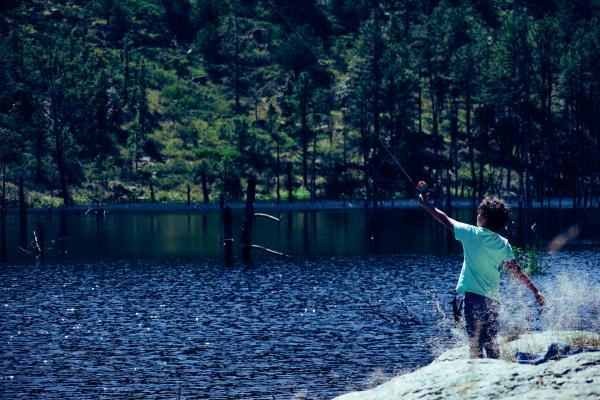 Kid fishing at lake
