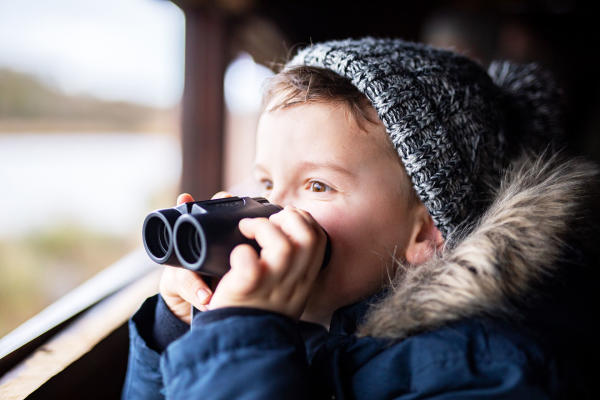 Child with binoculars