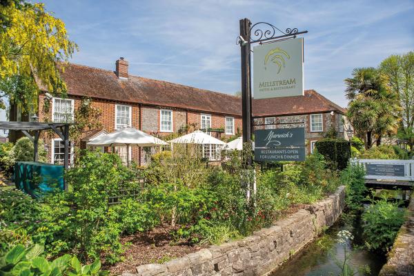 an exterior view of The Millstream hotel in Bosham, West Sussex
