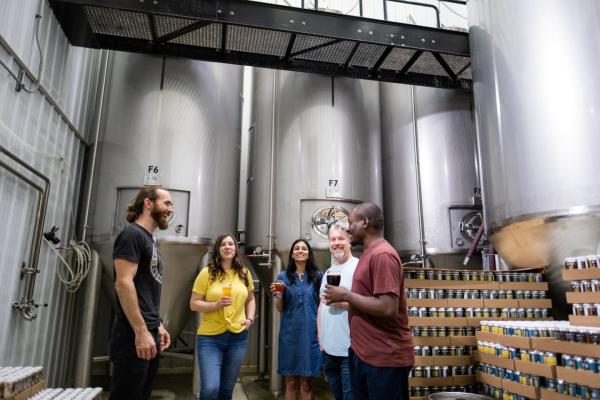 Group touring Copper State Brewery