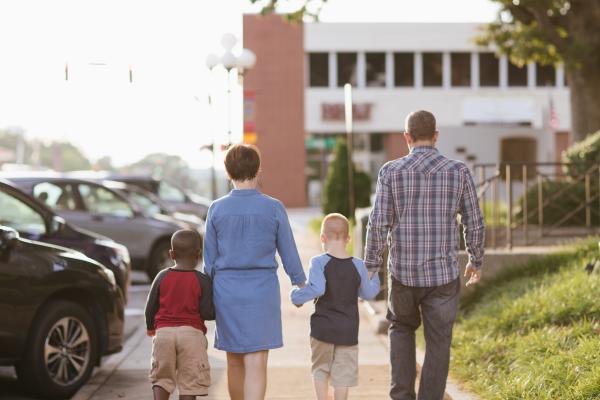 Family Walking in Downtown Newton