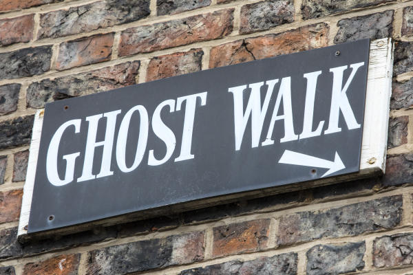 Sign that points to a ghost walk