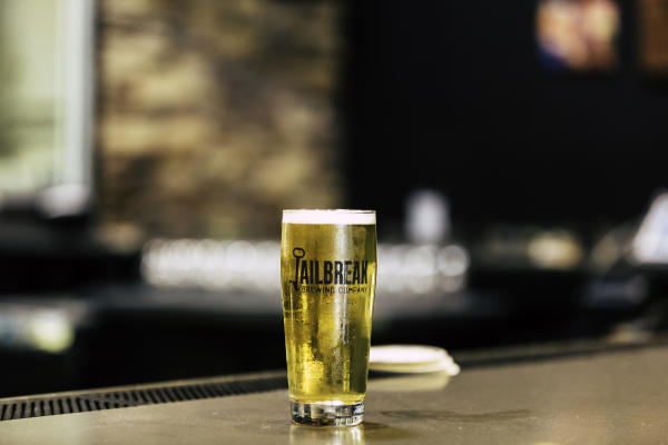 Jailbreak Brewing Company beer on bar