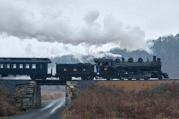 Engine 16 crossing a bridge along its journey