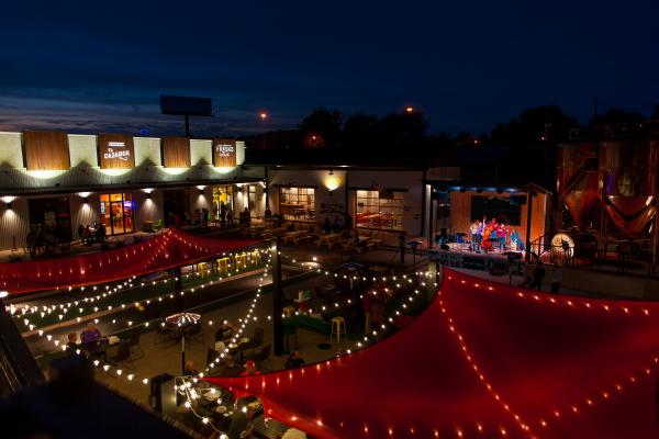 Stovehouse Huntsville aerial view of lights over courtyard in the dark