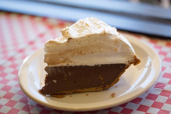 A slice of chocolate cream pie with a meringue topping from Mama's Daughter's Diner in Irving.