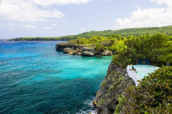 Image of a couple in pool at Great Huts