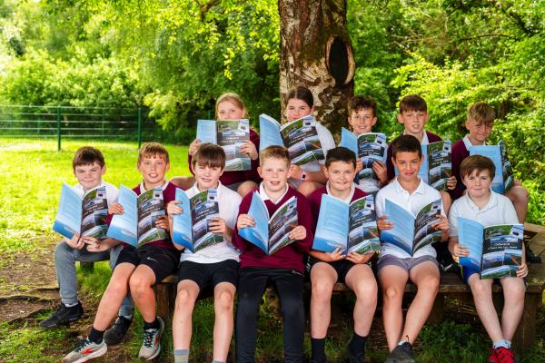 Cromane School JEP Winners Group sitting on Bench