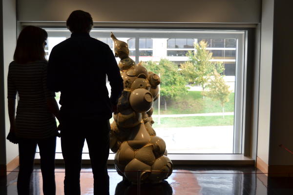 Silhouette of a couple at a museum