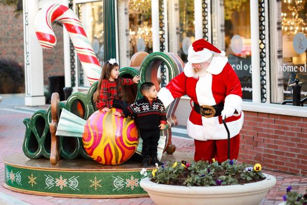 Santa with two children in downtown McKinney