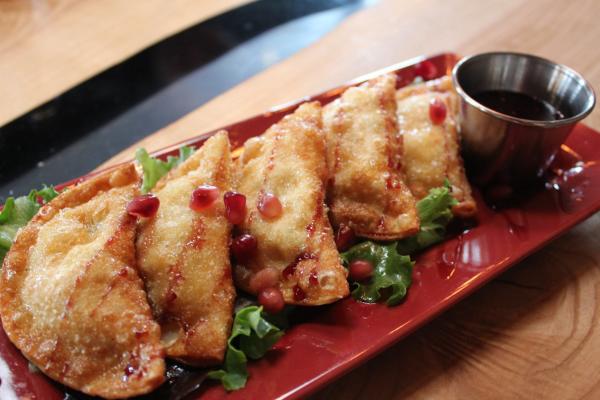 Plate of duck bacon wontons