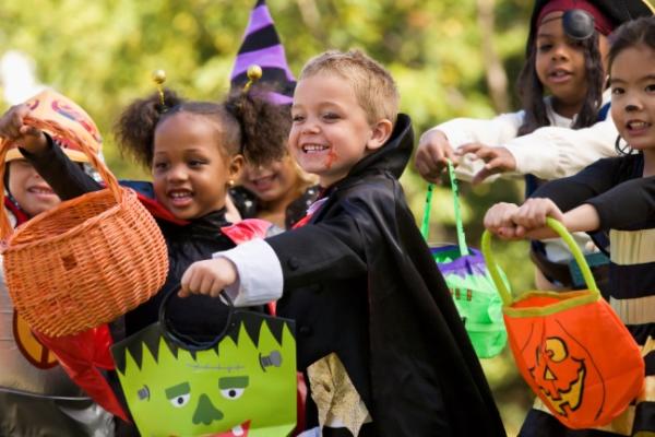 Kids in costumes trick-or-treating