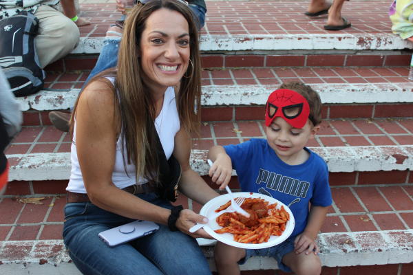Woman and little boy at Festa Italia in Monterey, CA