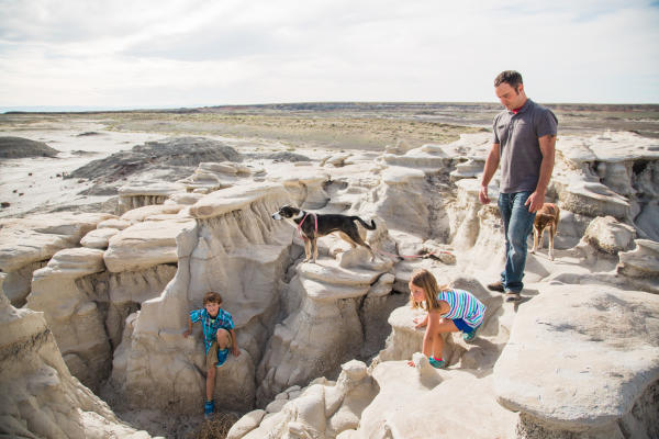 Family hiking Bisti/De-Na-Zin Wilderness  Area