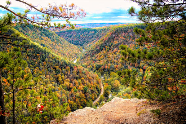Landscape view looking out over a river gorge with fall foliage