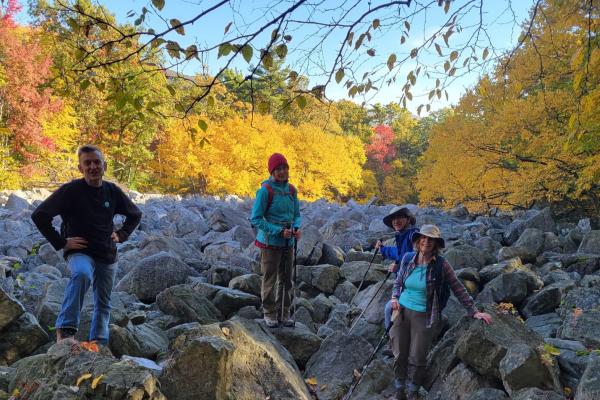 Hikers from the Philadelphia Trail Club gather for a hike in the fall foliage.