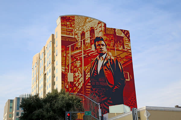 mural of johnny cash on the side of the residence inn hotel