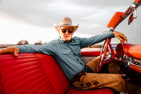 Country singer in vehicle