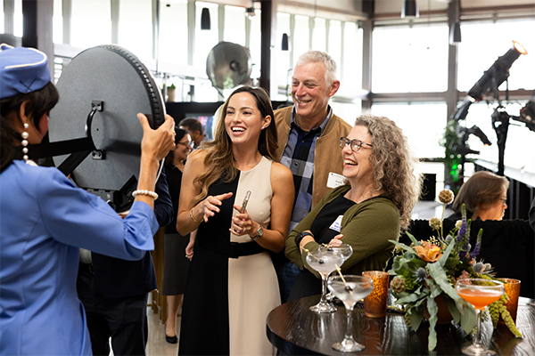 People participating in a photoshoot at The Camber