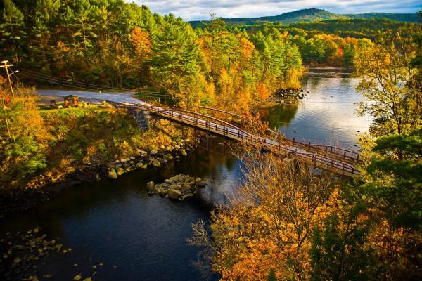 Fall foliage and bridge in Hadley NY