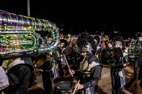 A local marching band in Mandeville's Krewe of Eve parade