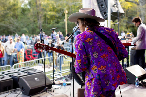 Guitarist performs for the crowd at Abita Fall Fest