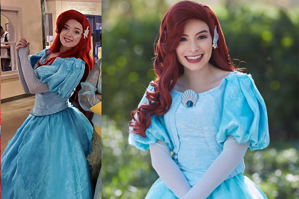 Princess Ariel wearing a blue dress and smiing