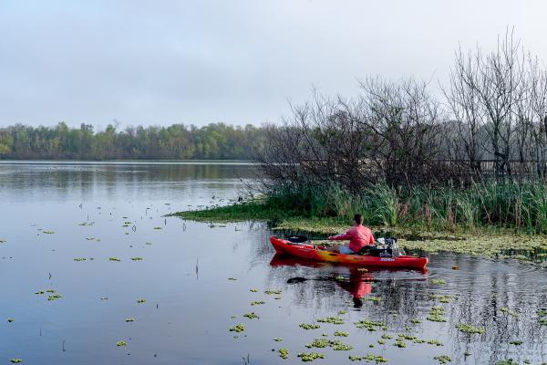 Man Motorboating at Cullinan Park In Sugar Land, TX