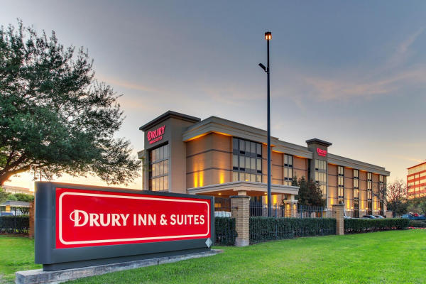 Exterior of a Drury Inn & Suites in the evening