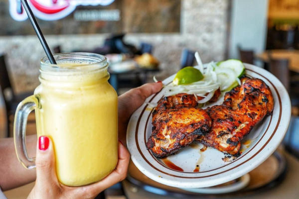 Chicken tikka breast and mango lassi at Bundu Khan BBQ.