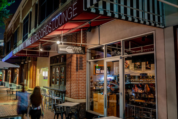 Exterior shot of Vino & Vinyl located at Sugar Land Town Square.